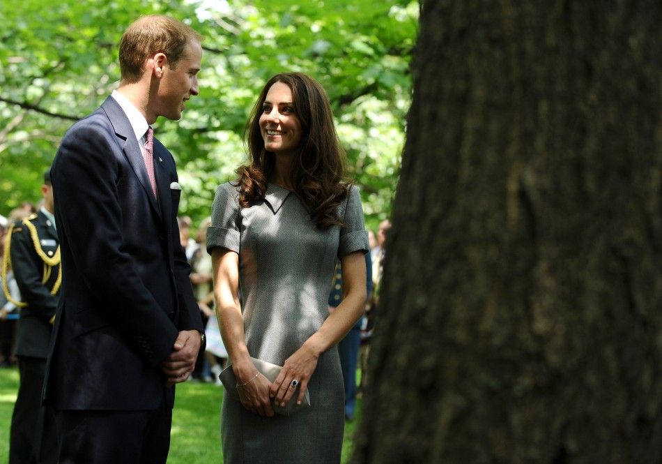William and Kate quietly reflect at a tree planted by Diana