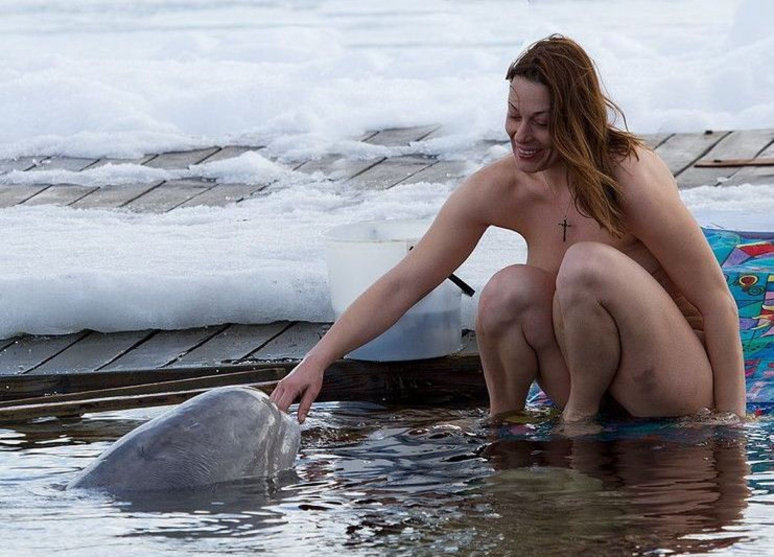 Naked ice swimming