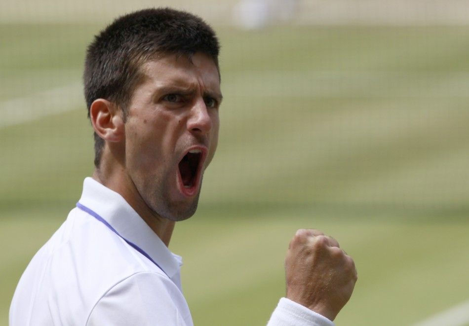 Novak Djokovic of Serbia reacts during his men039s singles final match against Rafael Nadal of Spain at the Wimbledon tennis championships in London.