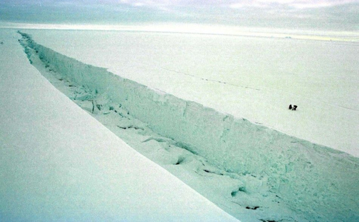 GREENPEACE CREWMEMBERS INSPECT THE ICE IN ANTARCTICA