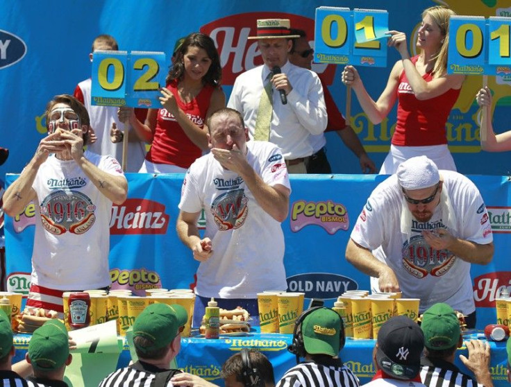 Contestants take part in Nathan's annual hot dog eating contest in the Coney Island section of New York