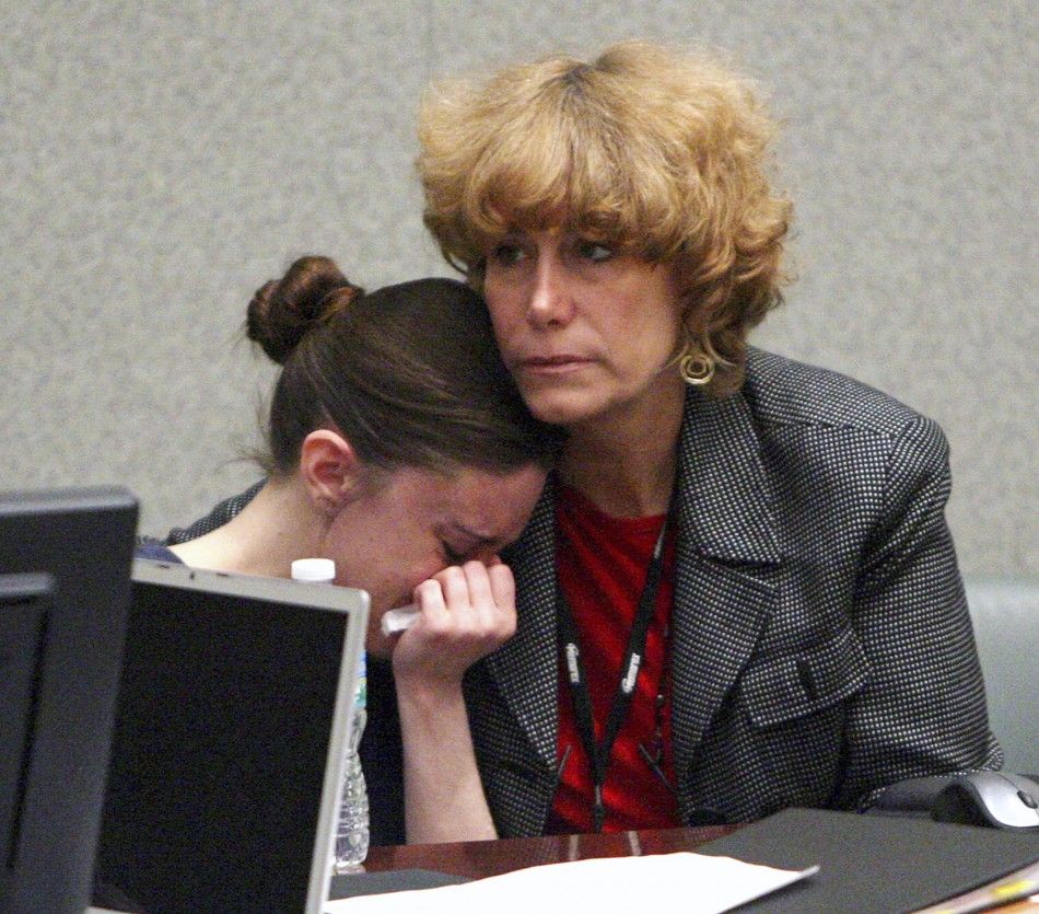 Casey Anthony sobs in the arms of defense attorney Dorothy Clay Sims