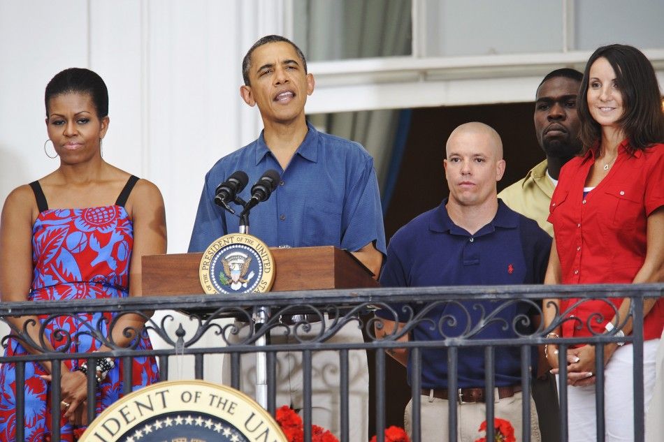 U.S. President Barack Obama addresses an Independence Day barbeque for members of the military at the White House in Washington