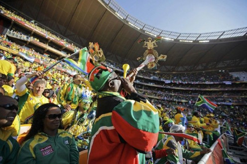 South African fans blow vuvuzelas before the opening match between Mexico and South Africa.