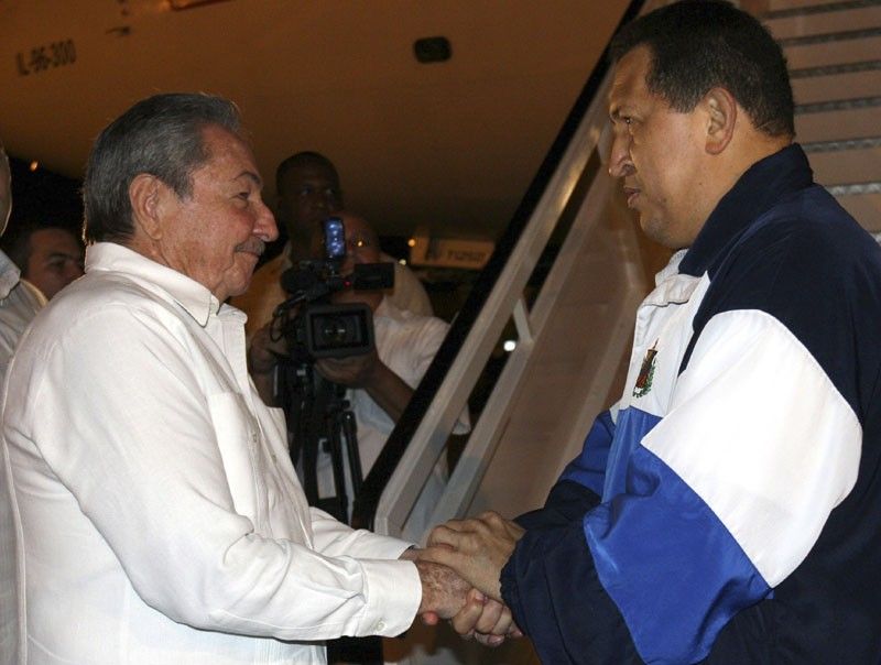 Venezuelas President Hugo Chavez R says goodbye to his Cuban counterpart Raul Castro