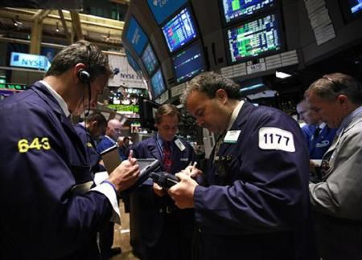 Traders work on the floor of the New York Stock Exchange