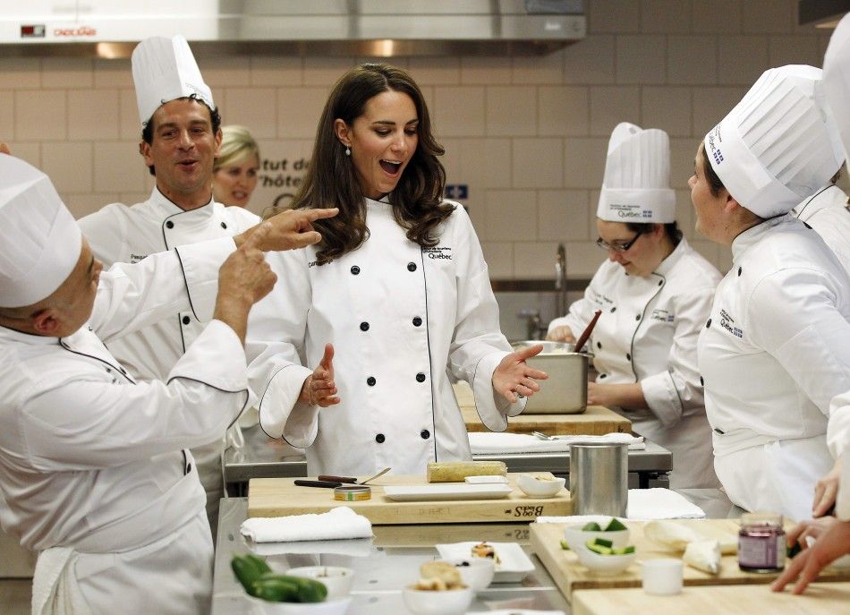 Catherine, Duchess of Cambridge, reacts during a cooking workshop at the Institut de tourisme et d039hotellerie du Quebec in Montreal July 2, 2011.