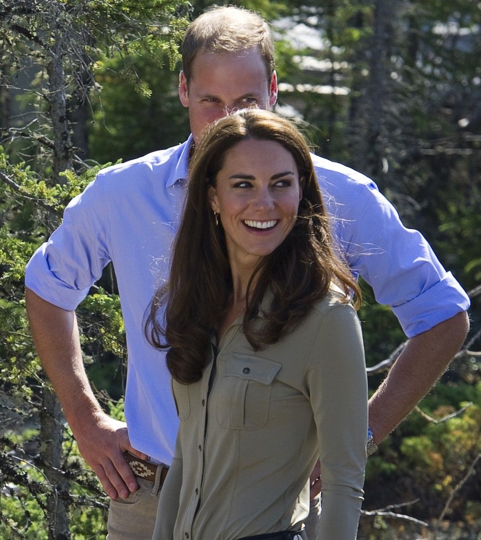 Britain039s Prince William and his wife Catherine listen to members of the Canadian Rangers while visiting Blatchford Lake