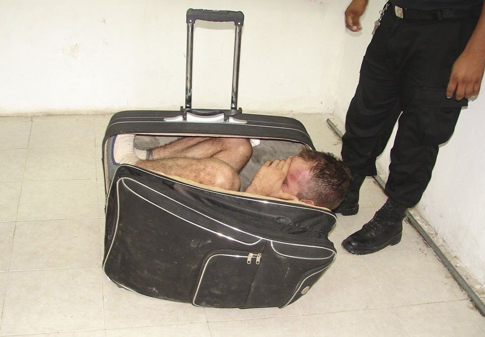 Startling visuals Man caught for escaping prison in suitcase.