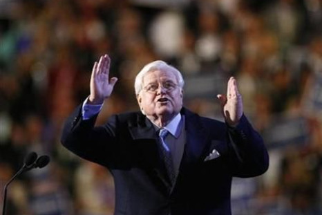 U.S. Senator Ted Kennedy gestures on stage at the 2008 Democratic National Convention in Denver