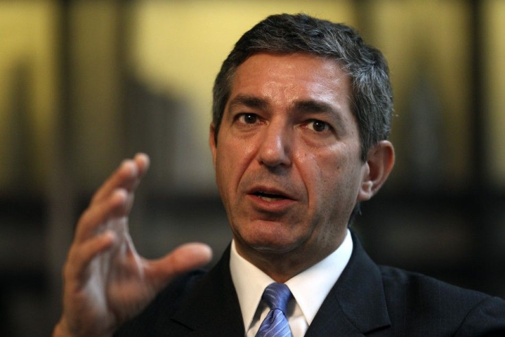 Greek Foreign Minister Lambrinidis gestures during an interview with Reuters in Berlin
