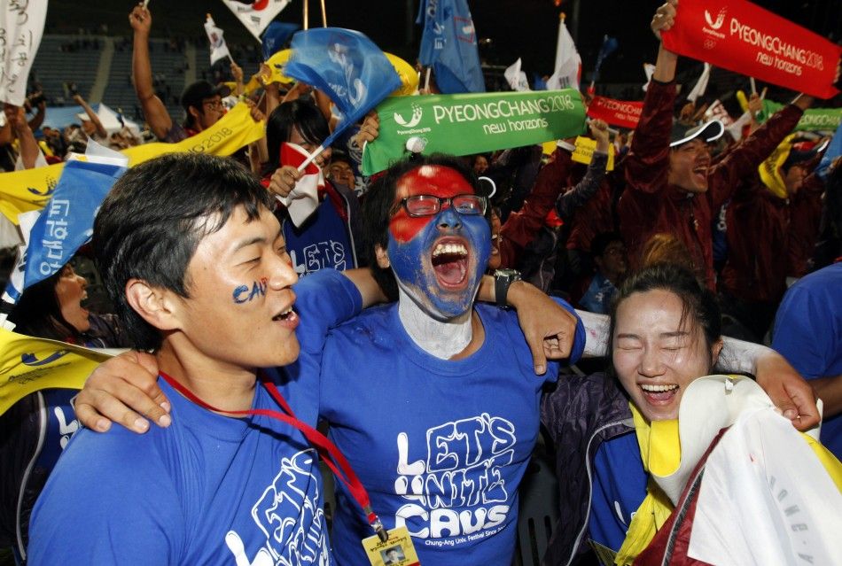 South Koreans celebrate as they hear that Pyeongchang won