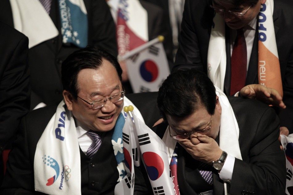 Members of the Pyeongchang 2018 bid committee react after the announcement