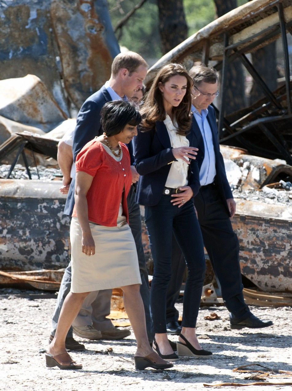 Britain039s Prince William and his wife Catherine, Duchess of Cambridge, visit the fire-devastated town of Slave Lake