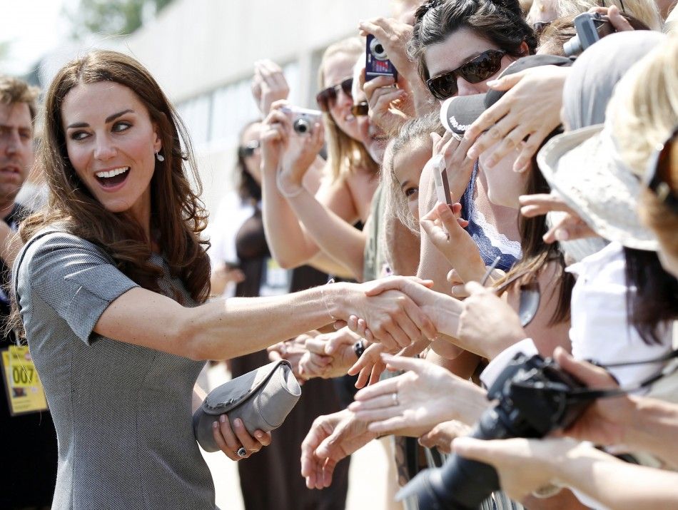 Catherine, Duchess of Cambridge, greets admirers following a reception