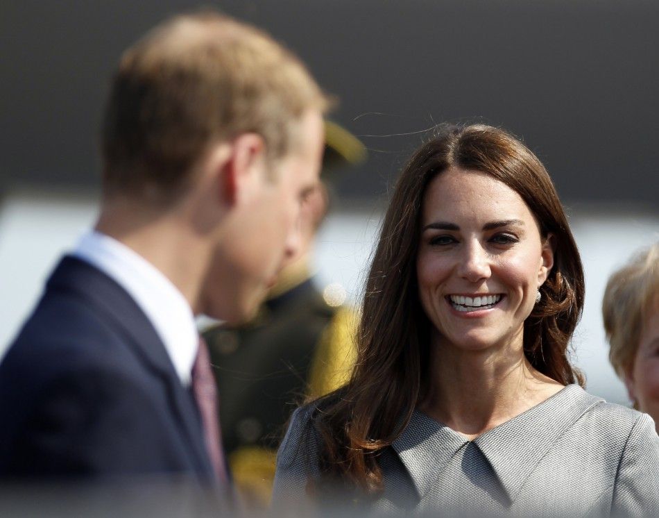 Catherine, Duchess of Cambridge, smiles after arriving at Pierre Elliott Trudeau International Airport