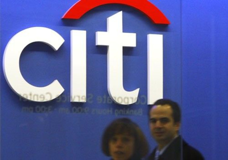 Employees walk through the Citigroup headquarters in New York