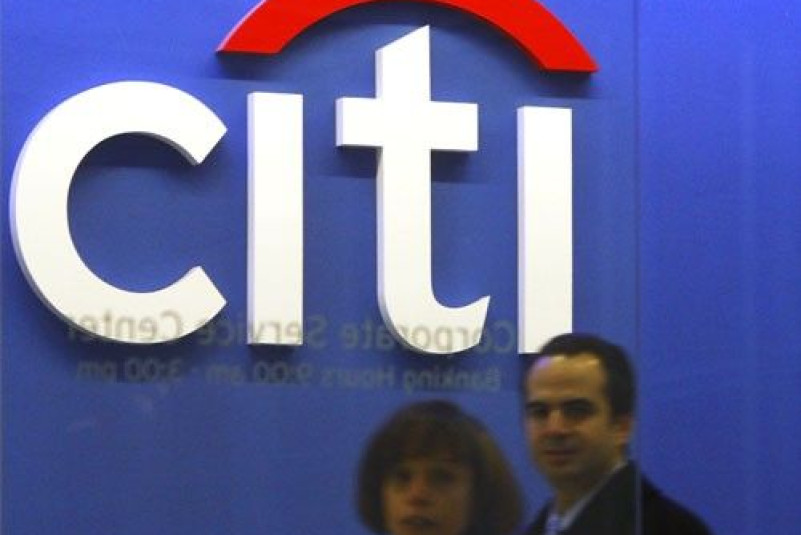 Employees walk through the Citigroup headquarters in New York