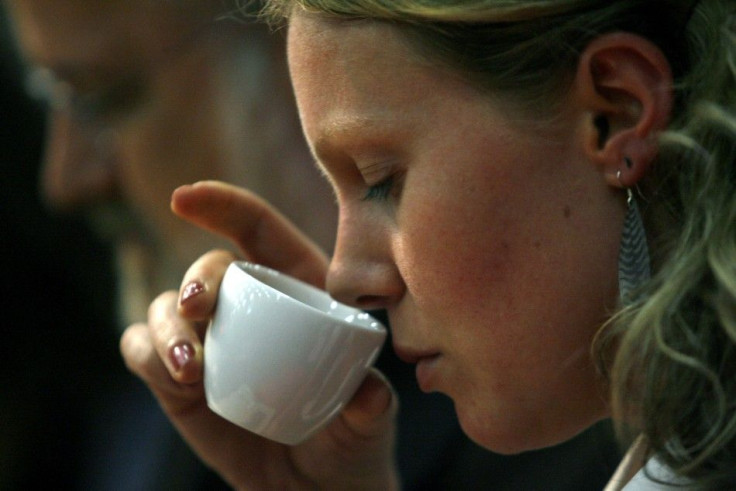 A Woman with a Cup of Coffee