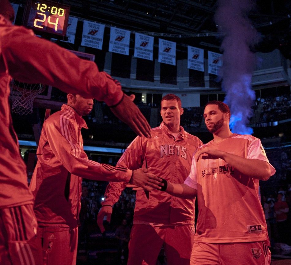 New Jersey Nets point guard Deron Williams is seen as the team is introduced to the crowd before the Nets played the Phoenix Suns