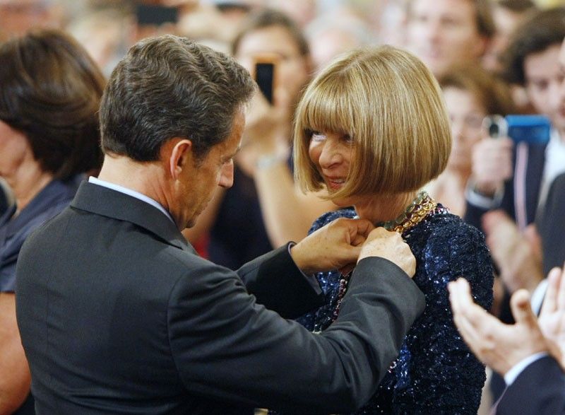 President Nicolas Sarkozy L presents the Medal to U.S. Vogue Editor