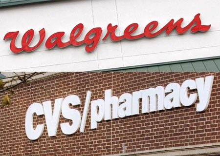 A combination photo showing the signs at a Walgreens store is seen in Golden, Colorado and (below) a CVS drugstore in Boston, Massachusetts