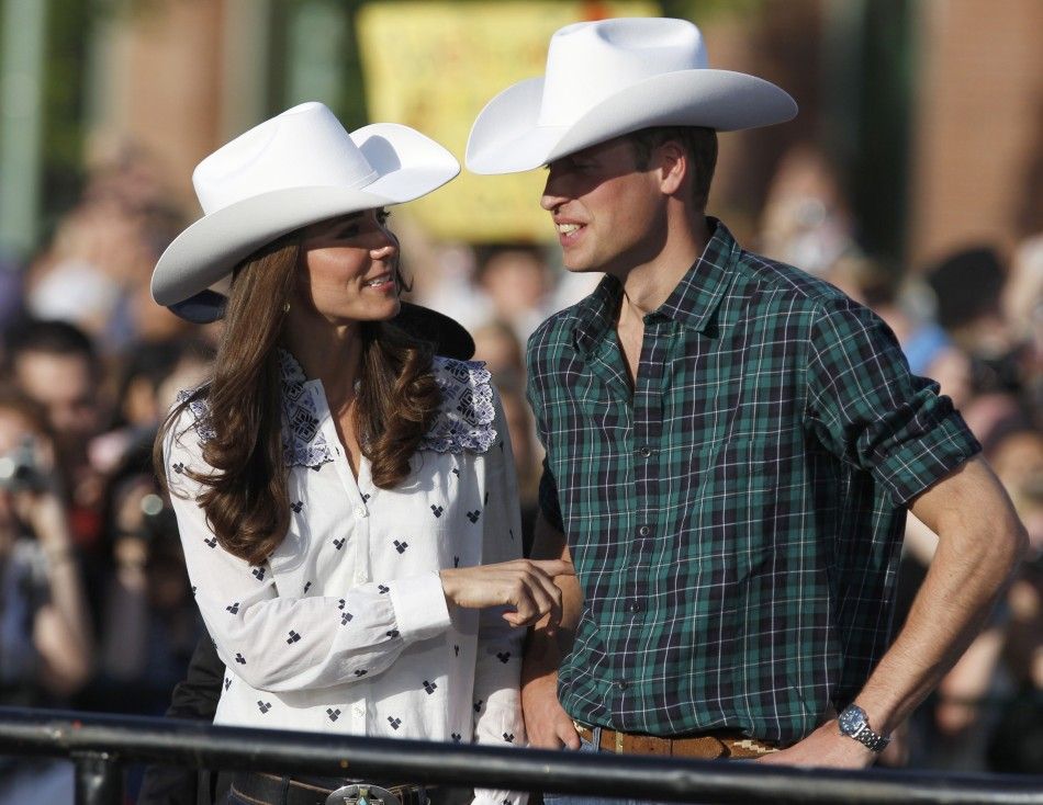 Britains Prince William and his wife Catherine, Duchess of Cambridge wear western clothes and cowboy hats in Calgary