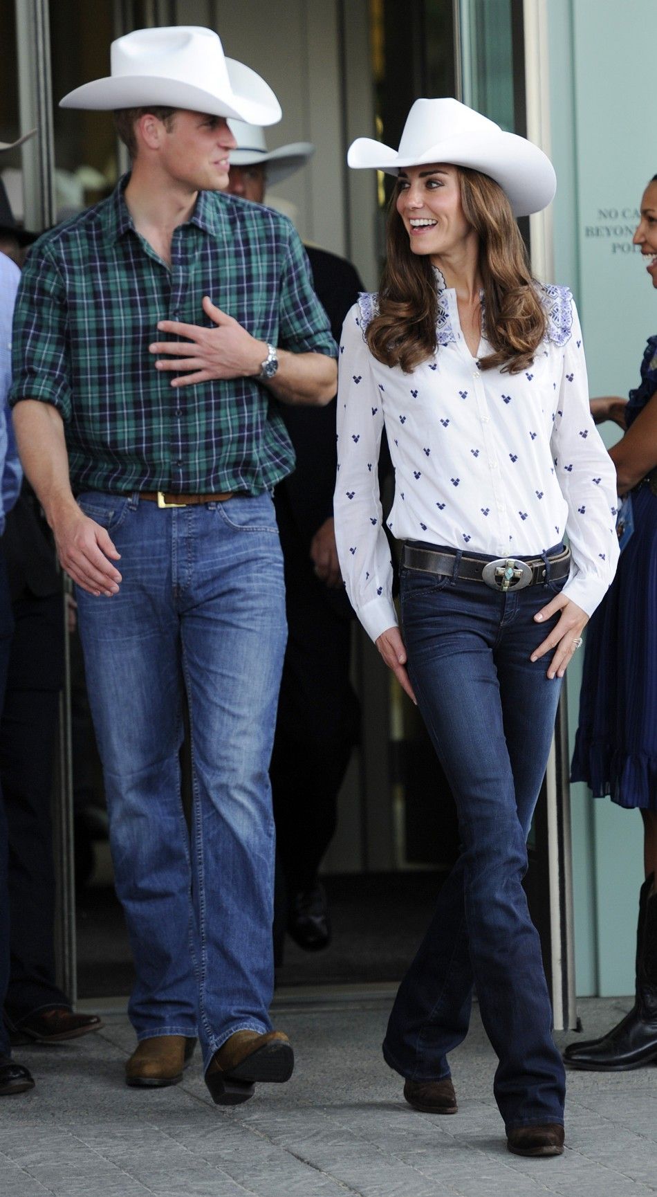 Britains Prince William and his wife Catherine, Duchess of Cambridge, depart the Calgary Stampede in Calgary.