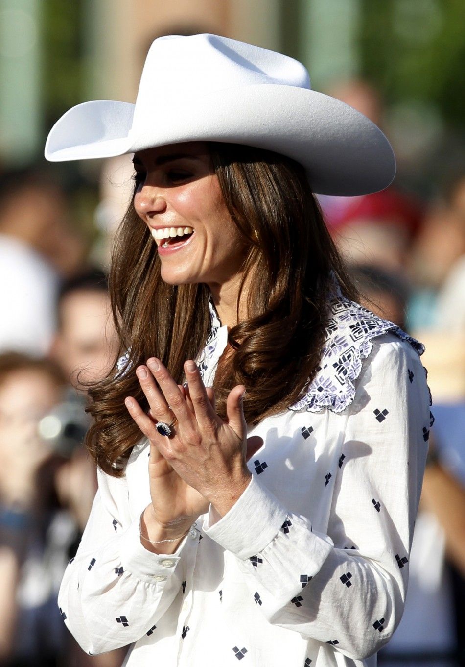 Catherine, Duchess of Cambridge, wears a cowboy hat as she attends a Canadian government reception in Calgary