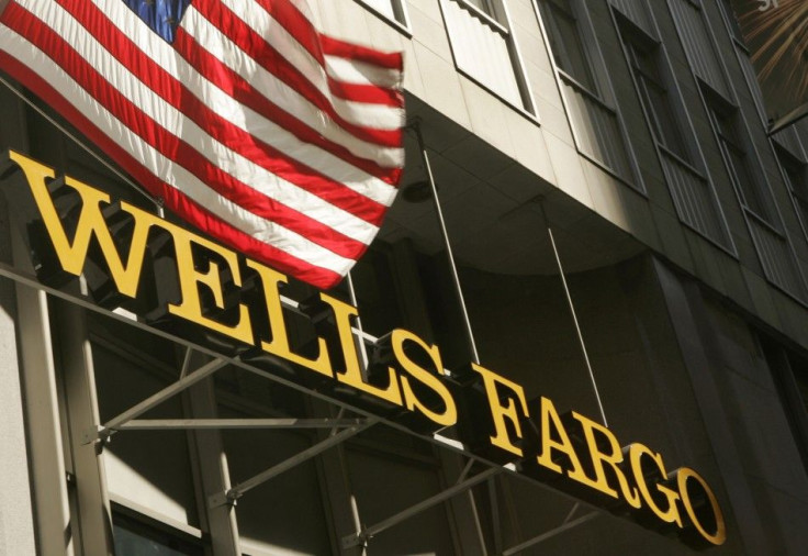 A U.S. flag flies above Wells Fargo & Co headquarters in San Francisco