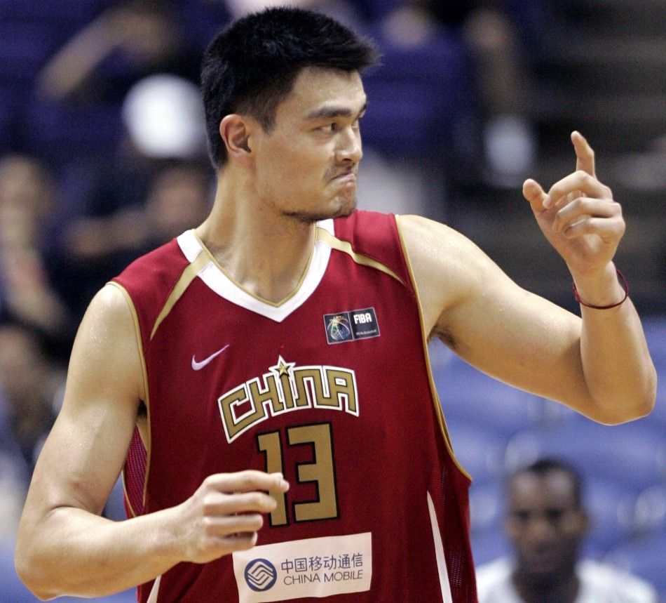 Chinas Yao reacts during the first round game against the US at the world basketball championships in Sapporo