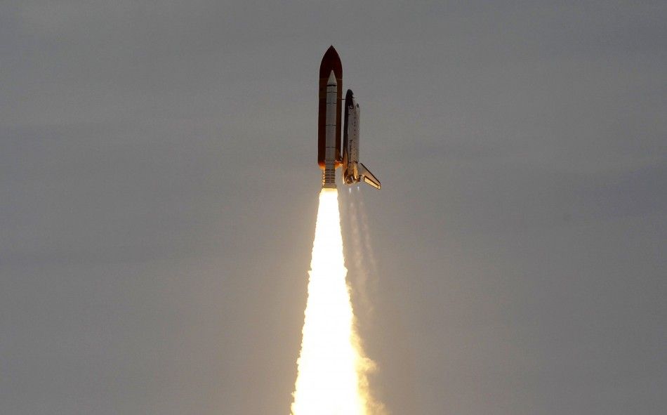 The space shuttle Atlantis, STS-135 lifts off from launch pad 39A at the Kennedy Space Center in Cape Canaveral