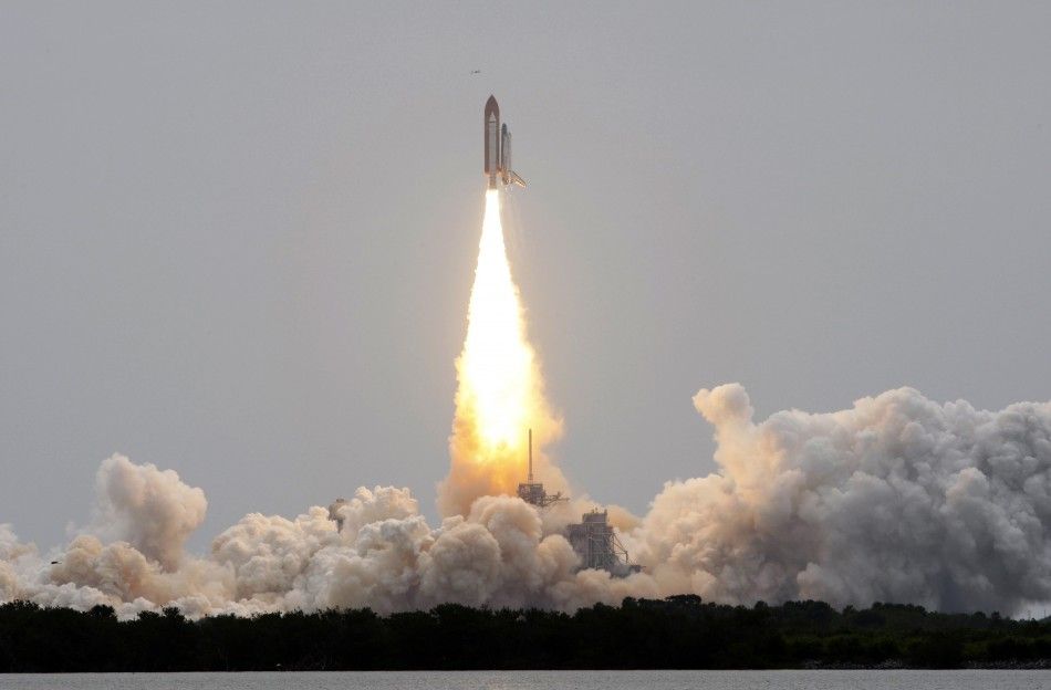 The space shuttle Atlantis, STS-135 lifts off from launch pad 39A at the Kennedy Space Center in Cape Canaveral
