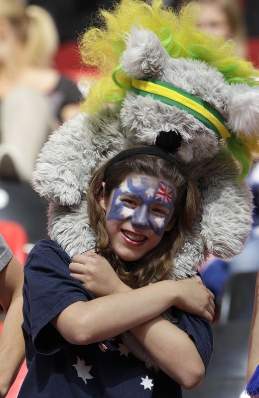 A fan of Australia reacts before the start of a match