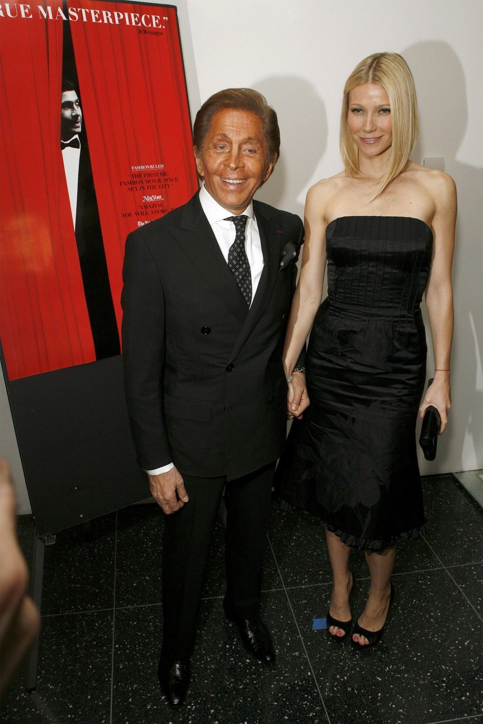 Designer Garavani arrives with actress Paltrow at the premiere of the film quotValentino The Last Emperorquot in New York