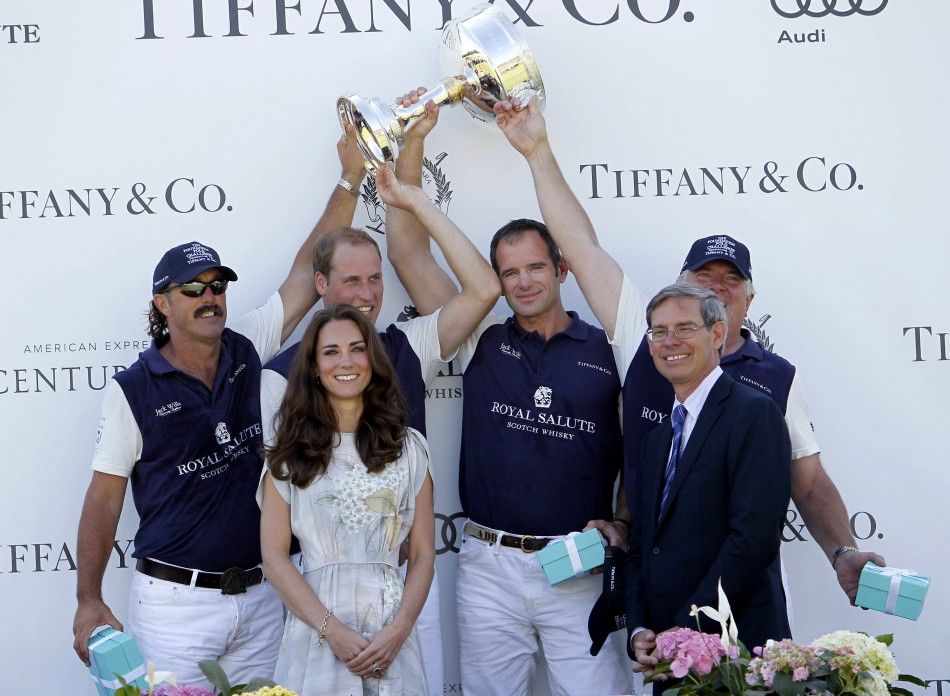 Catherine, Duchess of Cambridge, poses after presenting awards to her husbands team following a polo match at the Santa Barbara Polo and Racquet Club