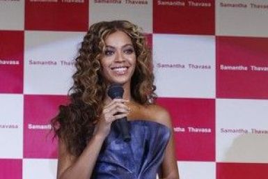 Singer Beyonce Knowles smiles during a promotional event for Japan's fashion brand Samantha Thavasa's new collection in collaboration with Disney in Chiba, east of Tokyo August 10, 2009.