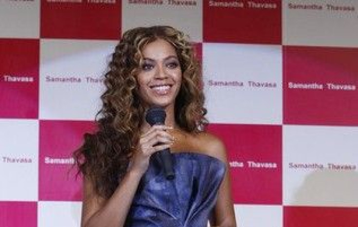 Singer Beyonce Knowles smiles during a promotional event for Japan's fashion brand Samantha Thavasa's new collection in collaboration with Disney in Chiba, east of Tokyo August 10, 2009.