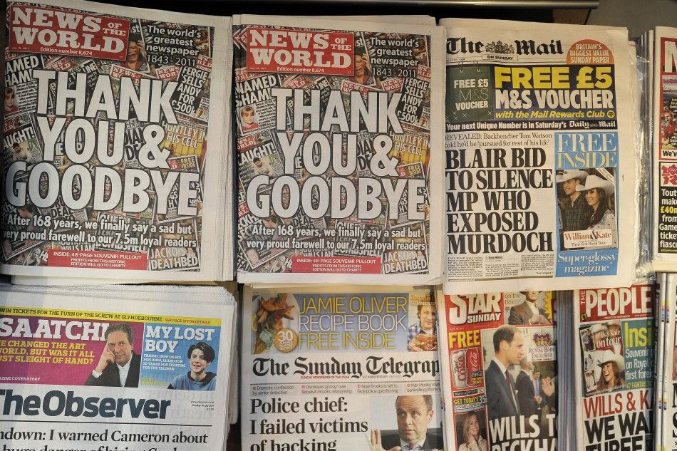 The last edition of News of the World newspaper goes on sale alongside other British Sunday newspapers in London