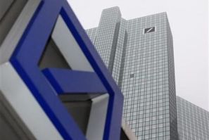 A Deutsche Bank logo is pictured in front of the Deutsche Bank headquarters in Frankfurt