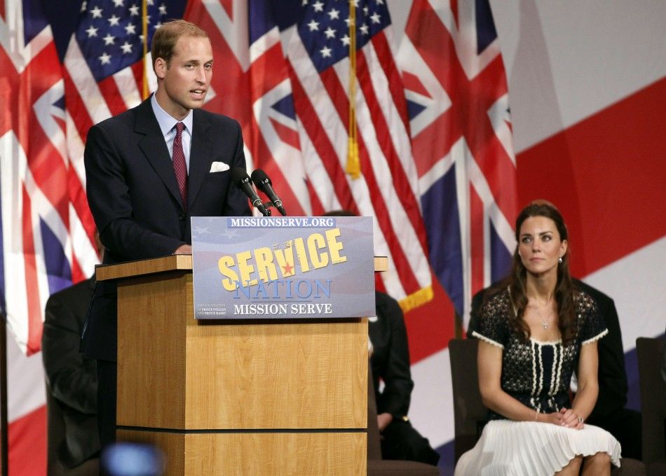 Britains Prince William speaks as his wife Catherine, Duchess of Cambridge R listens at the Mission Serve Hiring Our Heroes event in Culver City, California July 10, 2011. 
