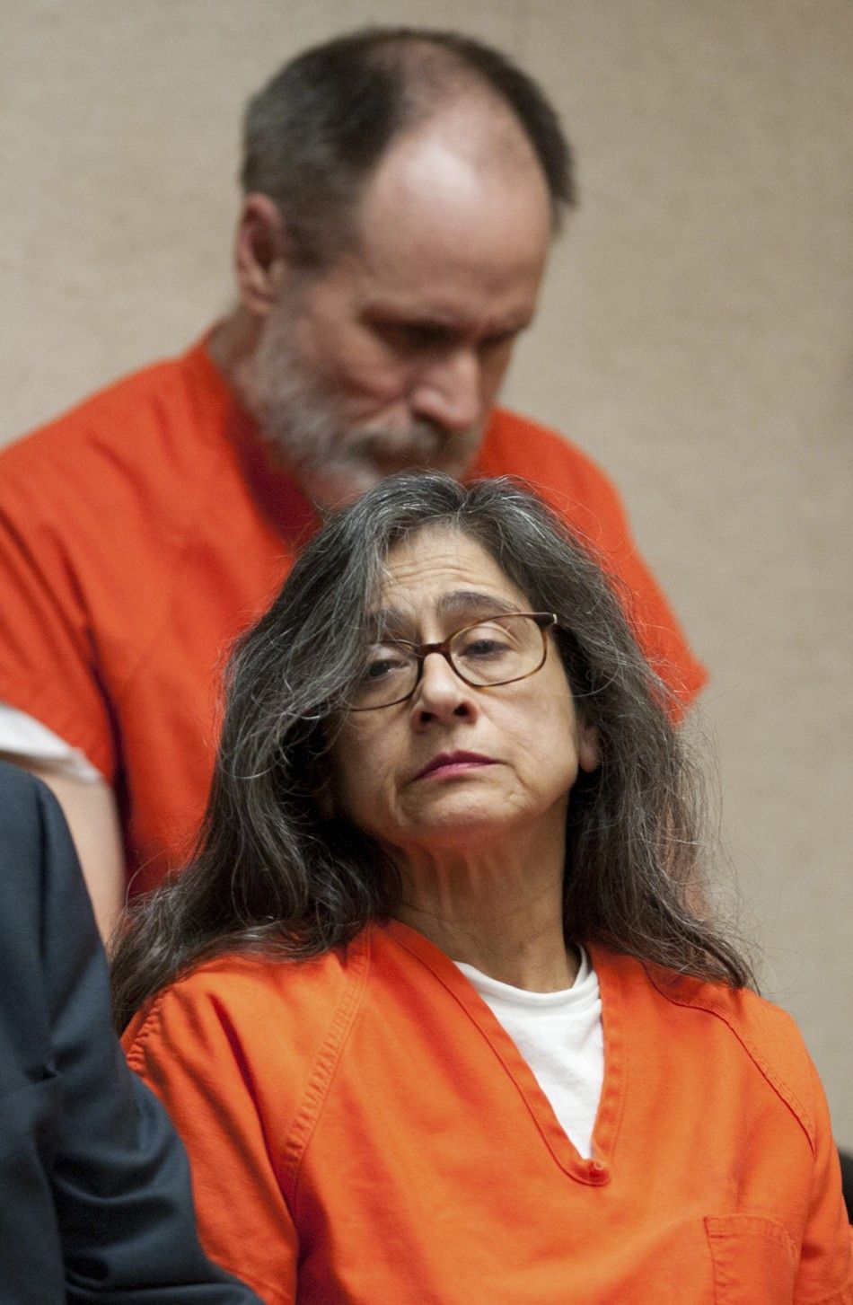 Nancy Garrido appears for her sentencing as her husband, Phillip Garrido, sits behind her in Placerville