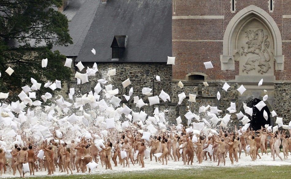 Naked volunteers pose for U.S. artist Spencer Tunick in Gaasbeek