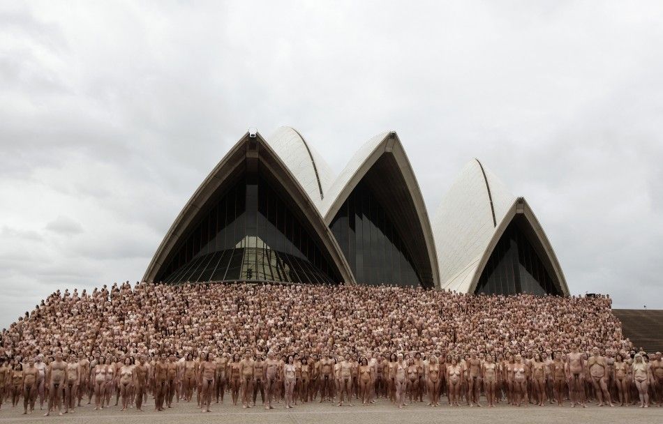 Naked volunteers pose for U.S. Artist Tunick in front of the Sydney Opera House
