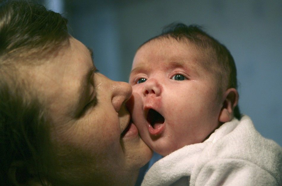 Tatyana Khalina kisses her baby Nadia in October 2007.