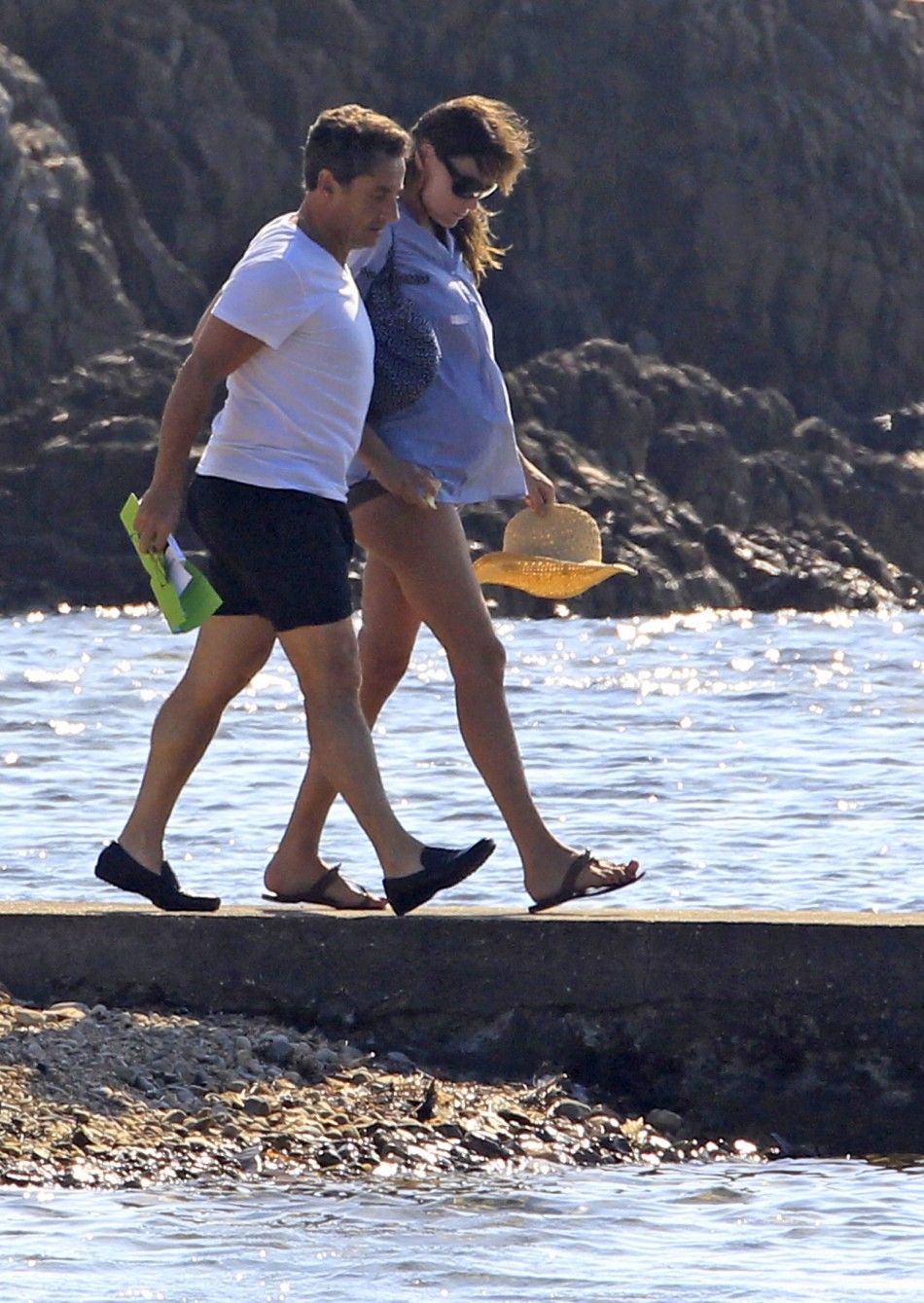 Holidaying Carla Bruni Reveals her Pregnant 039Rounded039 Belly on the Beach