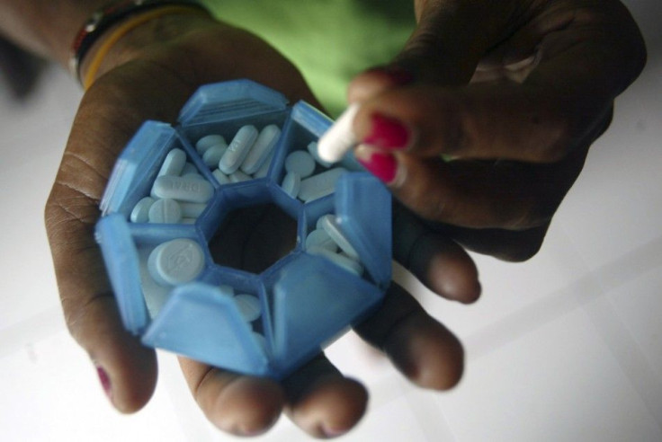 Woman prepares HIV/AIDS drugs