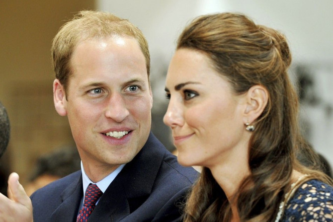 Britain&#039;s Prince William looks at his wife, Catherine, the Duchess of Cambridge
