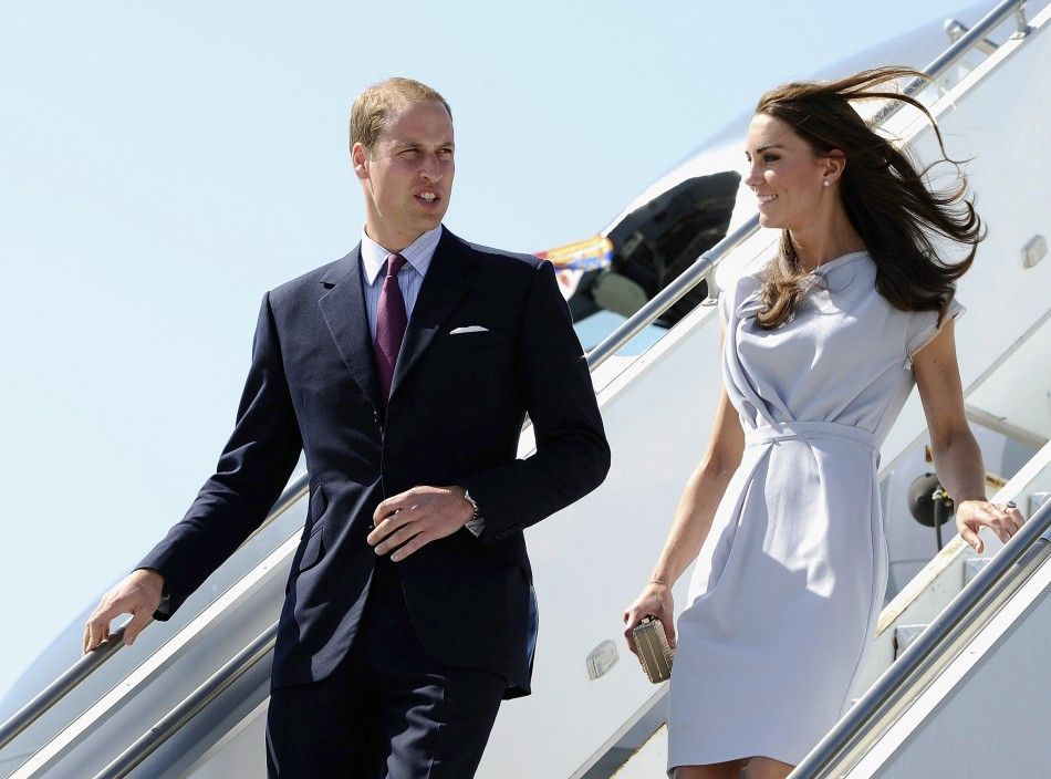 Britains Prince William and his wife Catherine, Duchess of Cambridge, arrive at Los Angeles International Airport