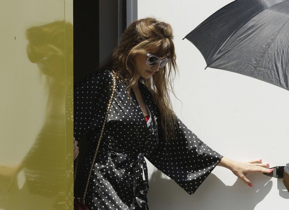 Spanish actress Penelope Cruz leaves her dressing room